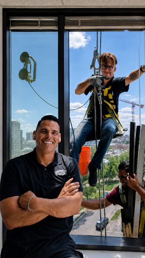 Mile High Glass team working on a high-rise window installation